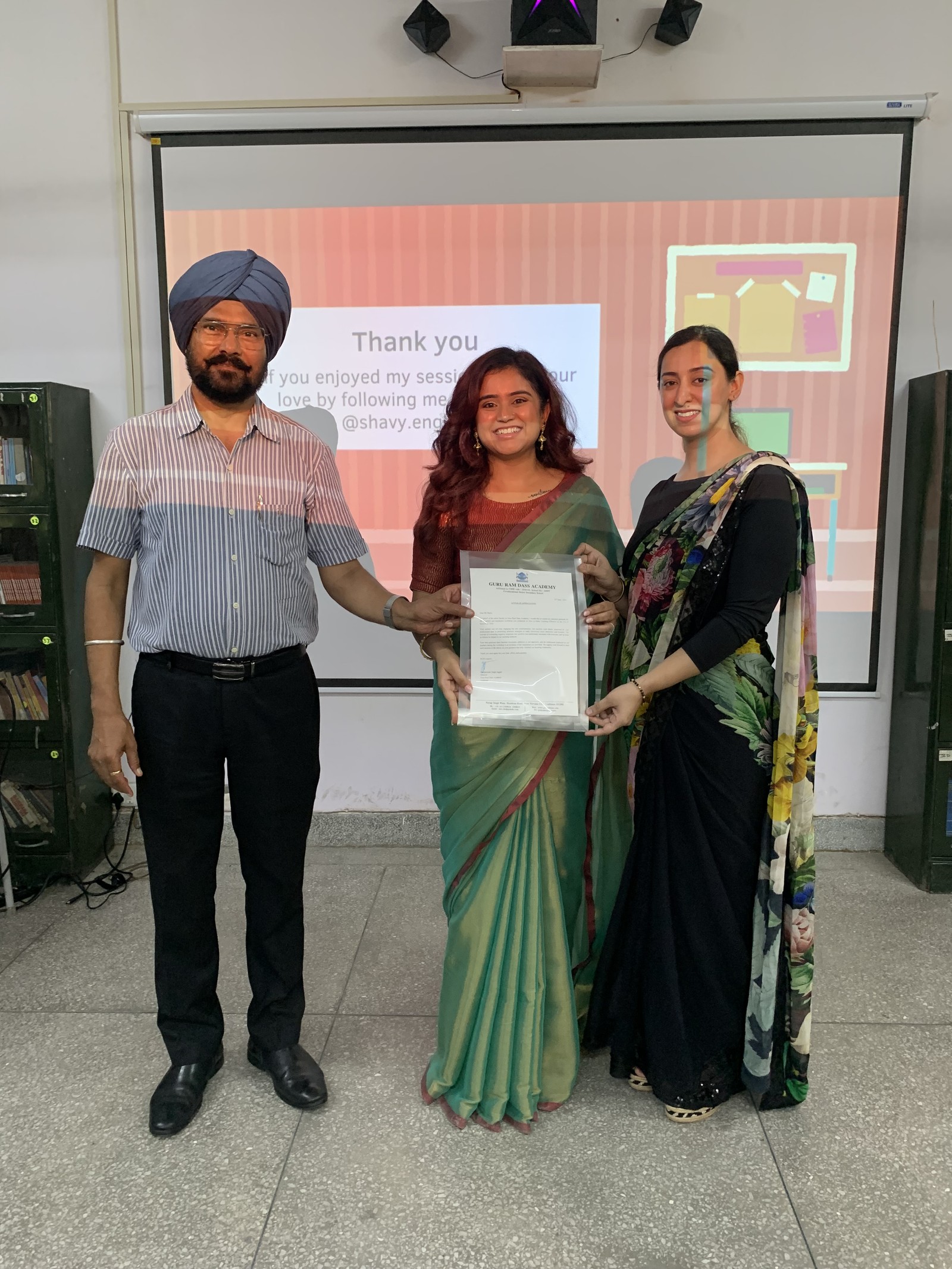 Coach Shavy Jain receiving a certificate at Guru Ram Dass Academy