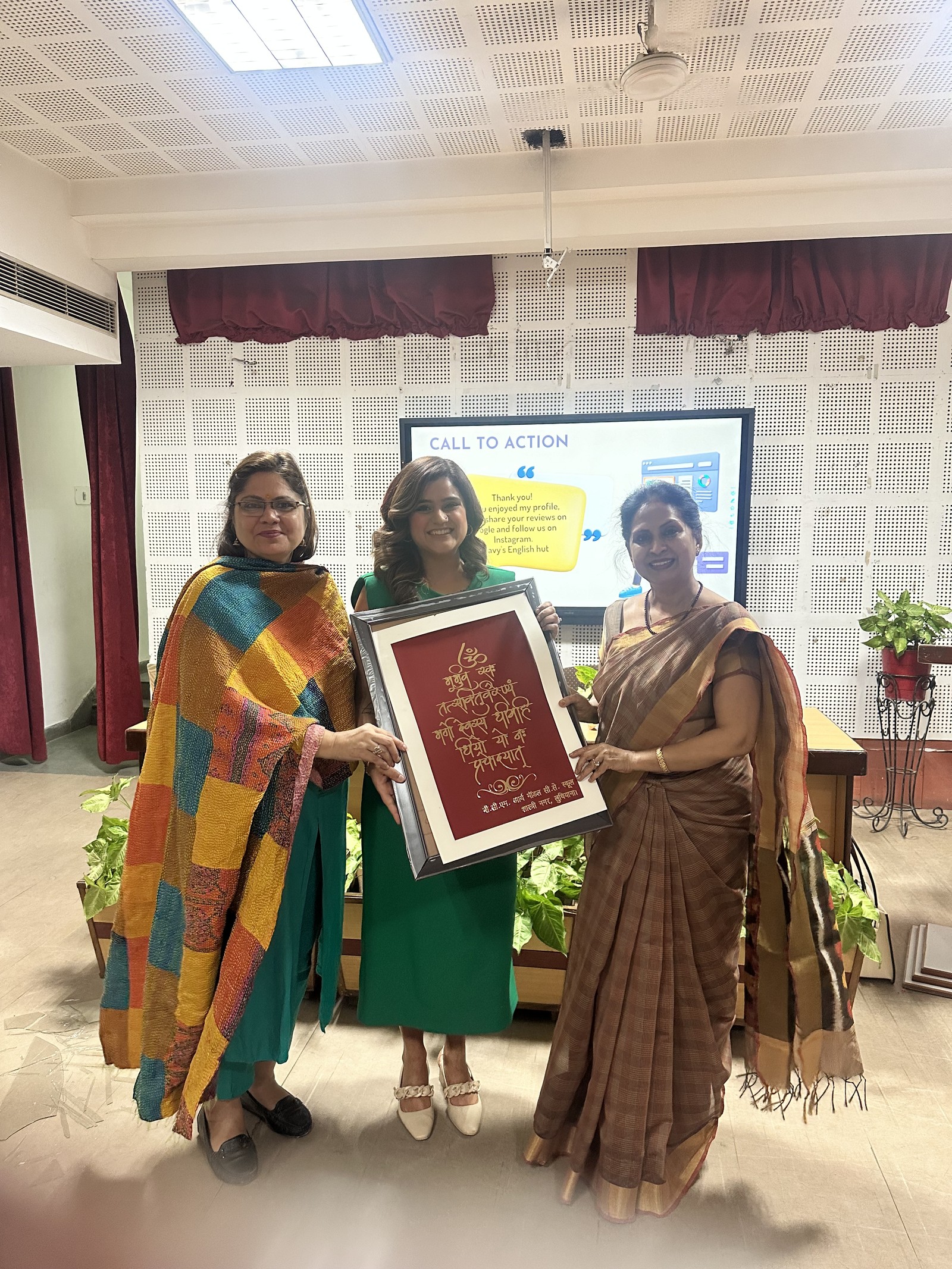 Coach Shavy Jain receiving a framed appreciation certificate
