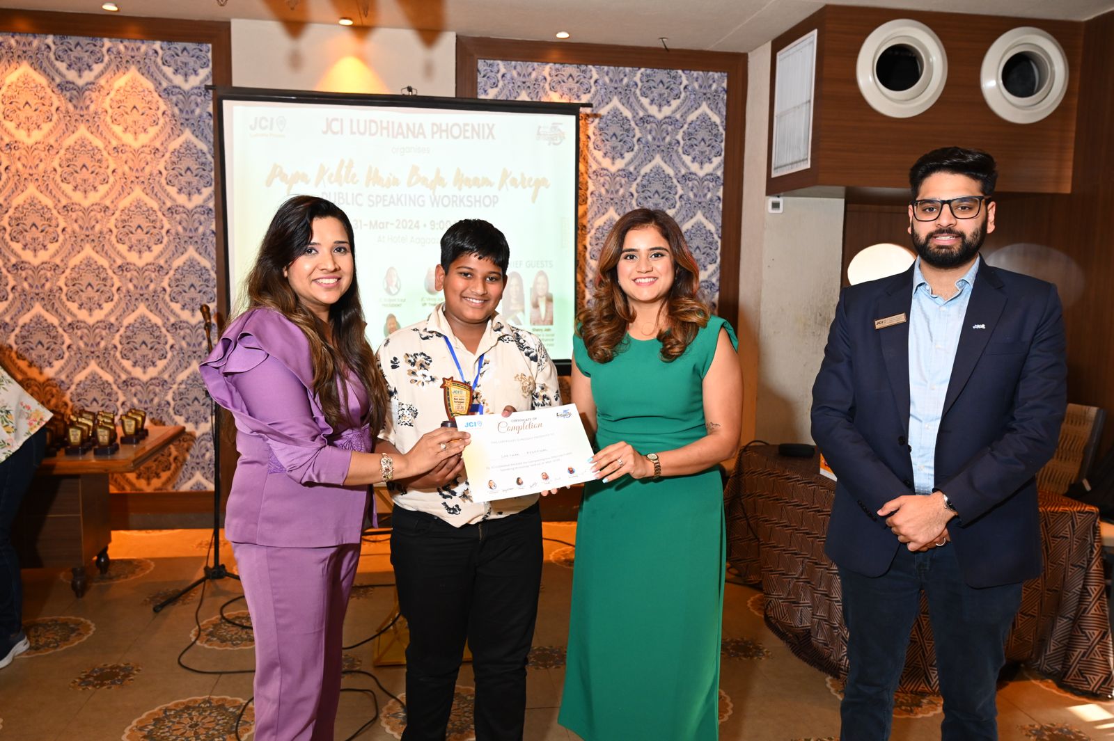 Coach Shavy Jain presenting a certificate at the JCI Ludhiana Phoenix public speaking workshop