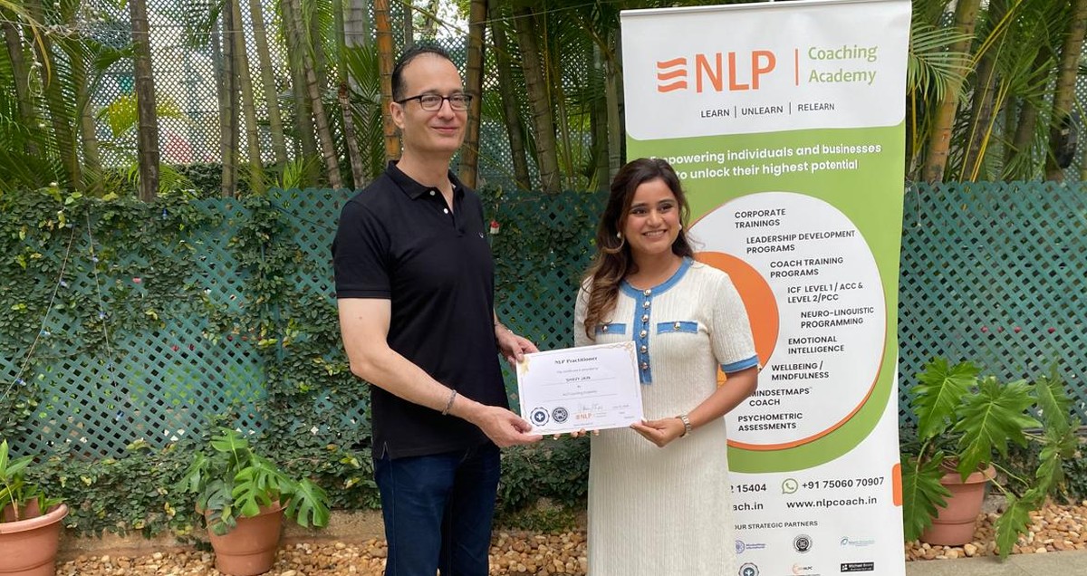 Coach Shavy receiving her NLP Practitioner certification