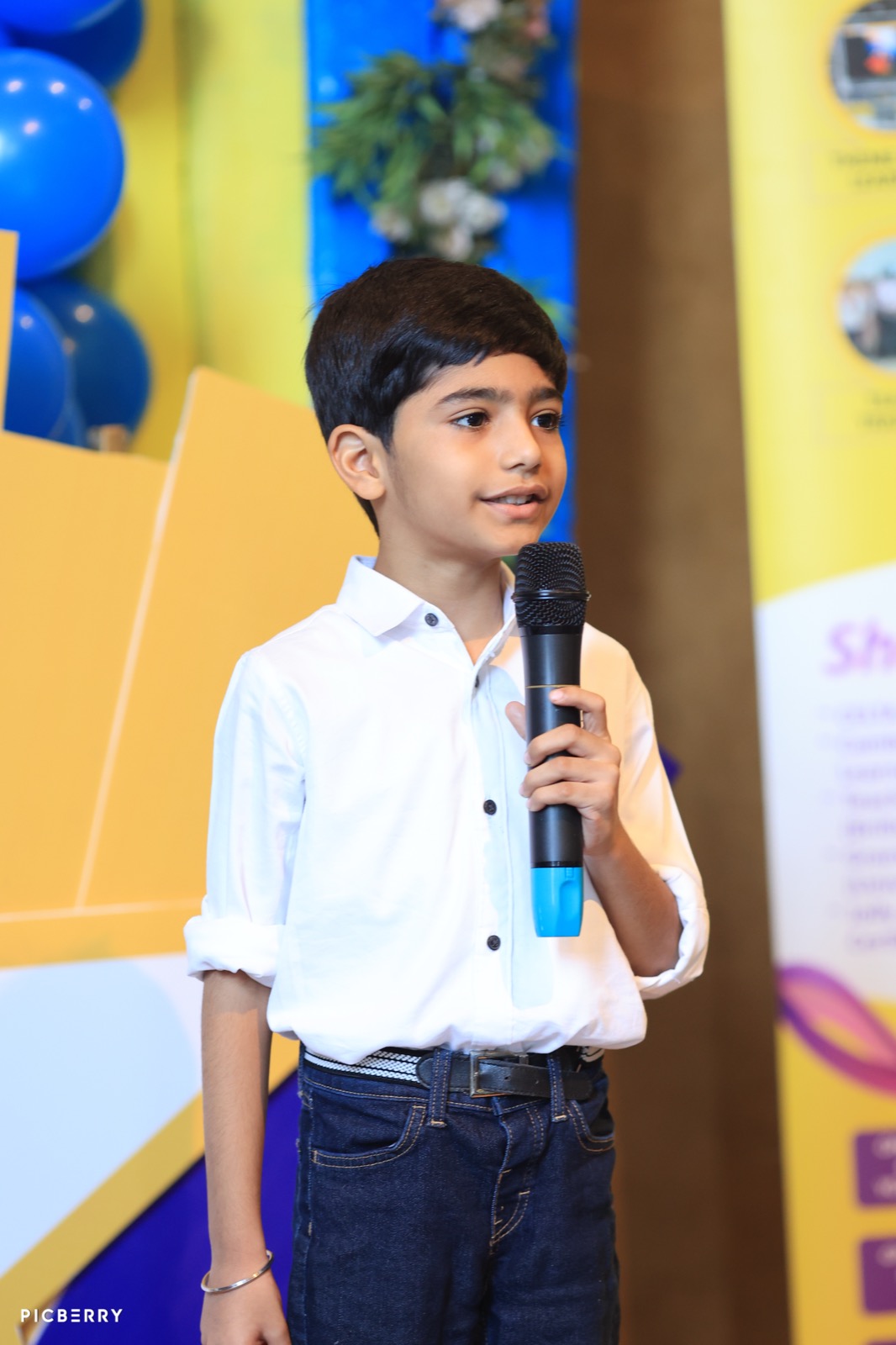 Student pitching a product idea with a poster at Entrepreneurship Day
