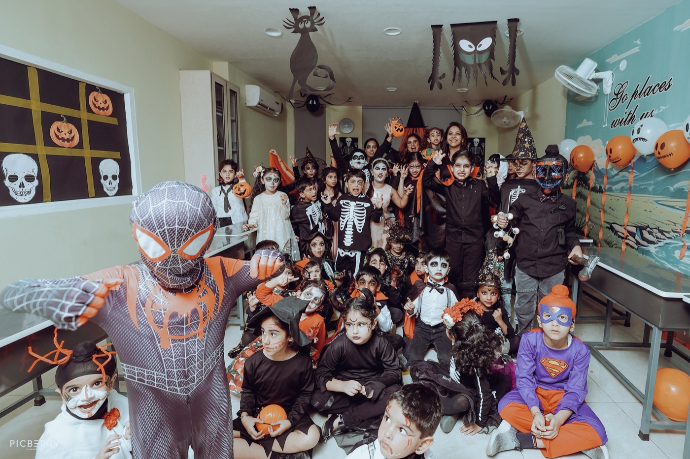 Students in costume at a Shavy's English Hut Halloween celebration