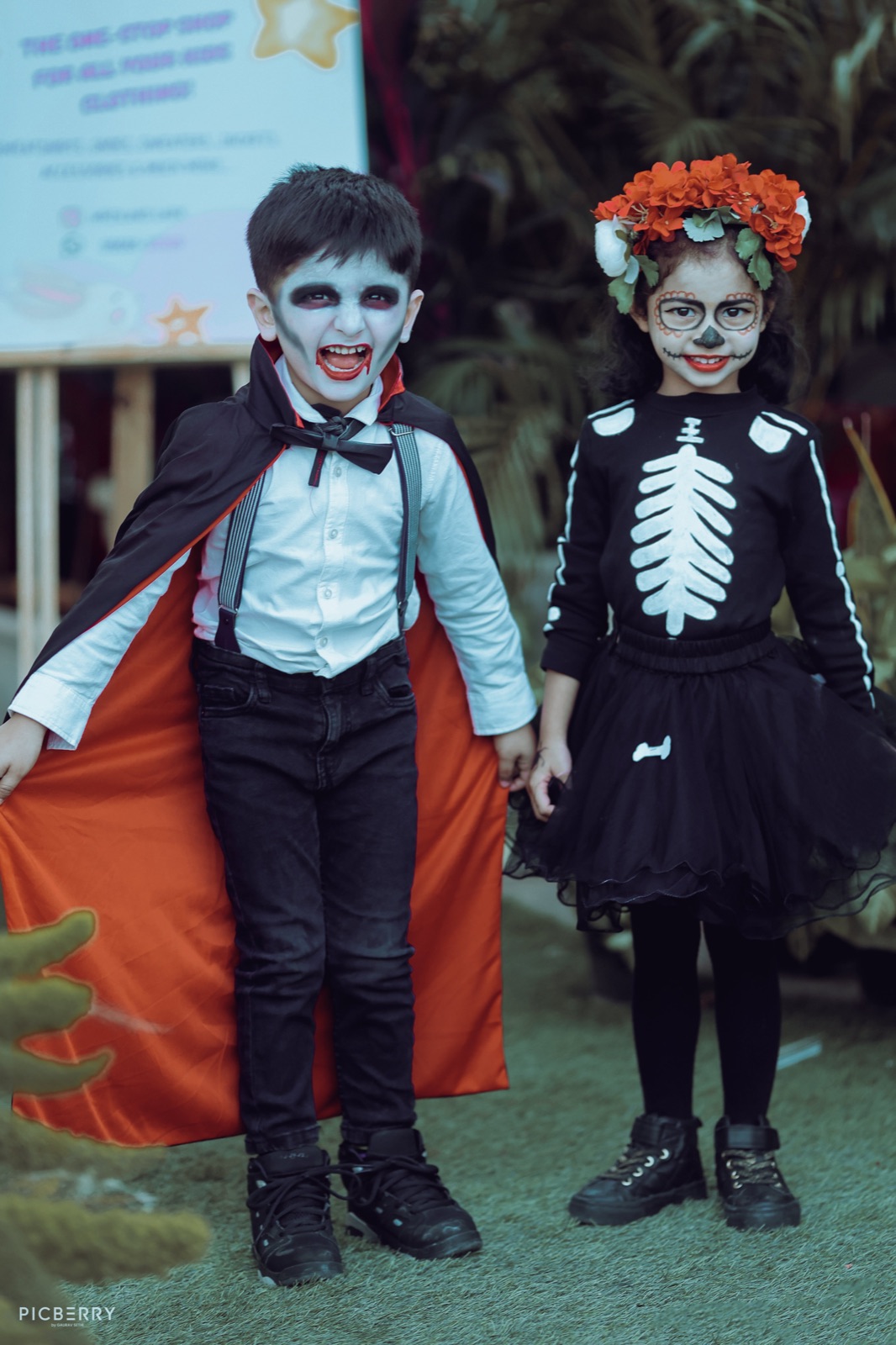 Two students in costume at a Shavy's English Hut event
