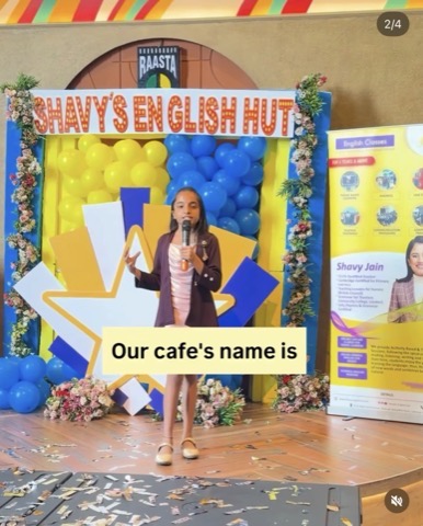 B1 Level student on stage at a public speaking event